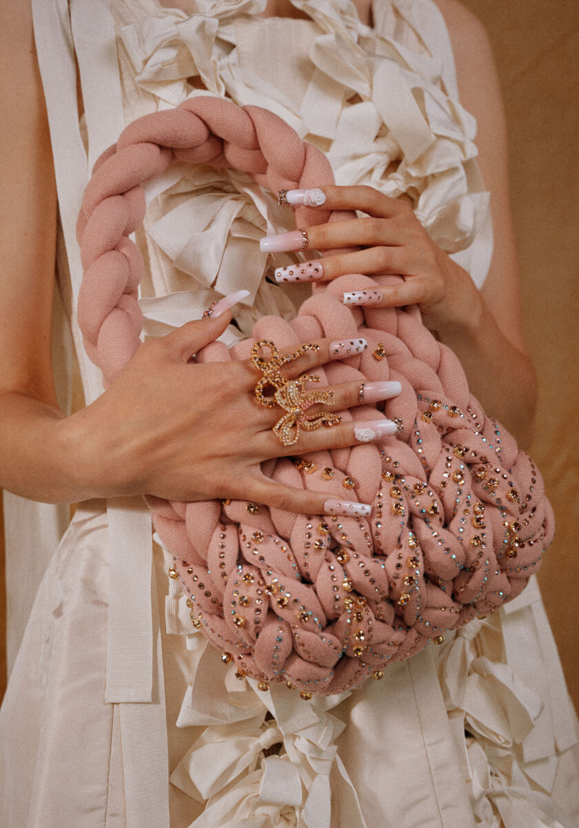 handbag and nails with pink crystals